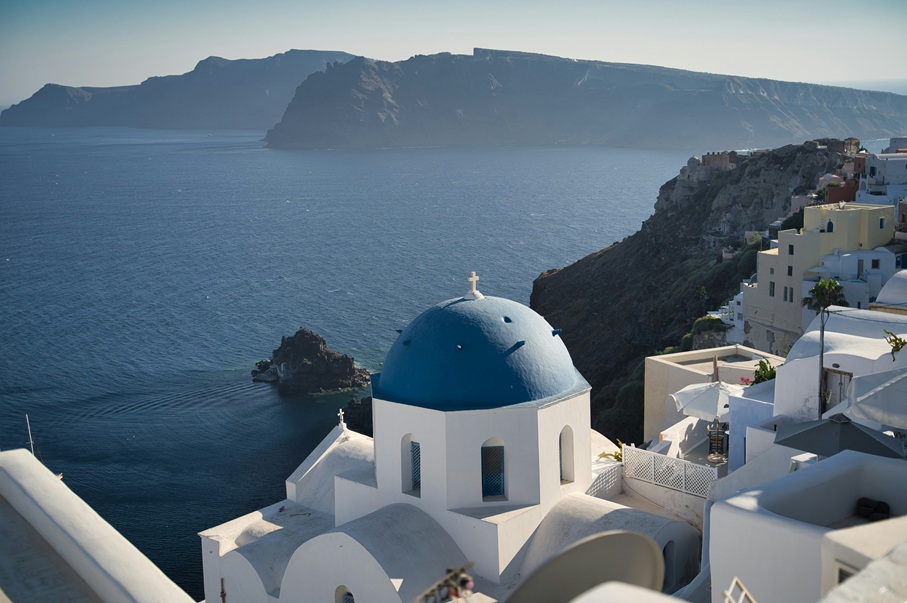 Greek Islands — whitewashed villages and cobalt bays, curated with private yachting, berths, and effortless island-to-island pacing